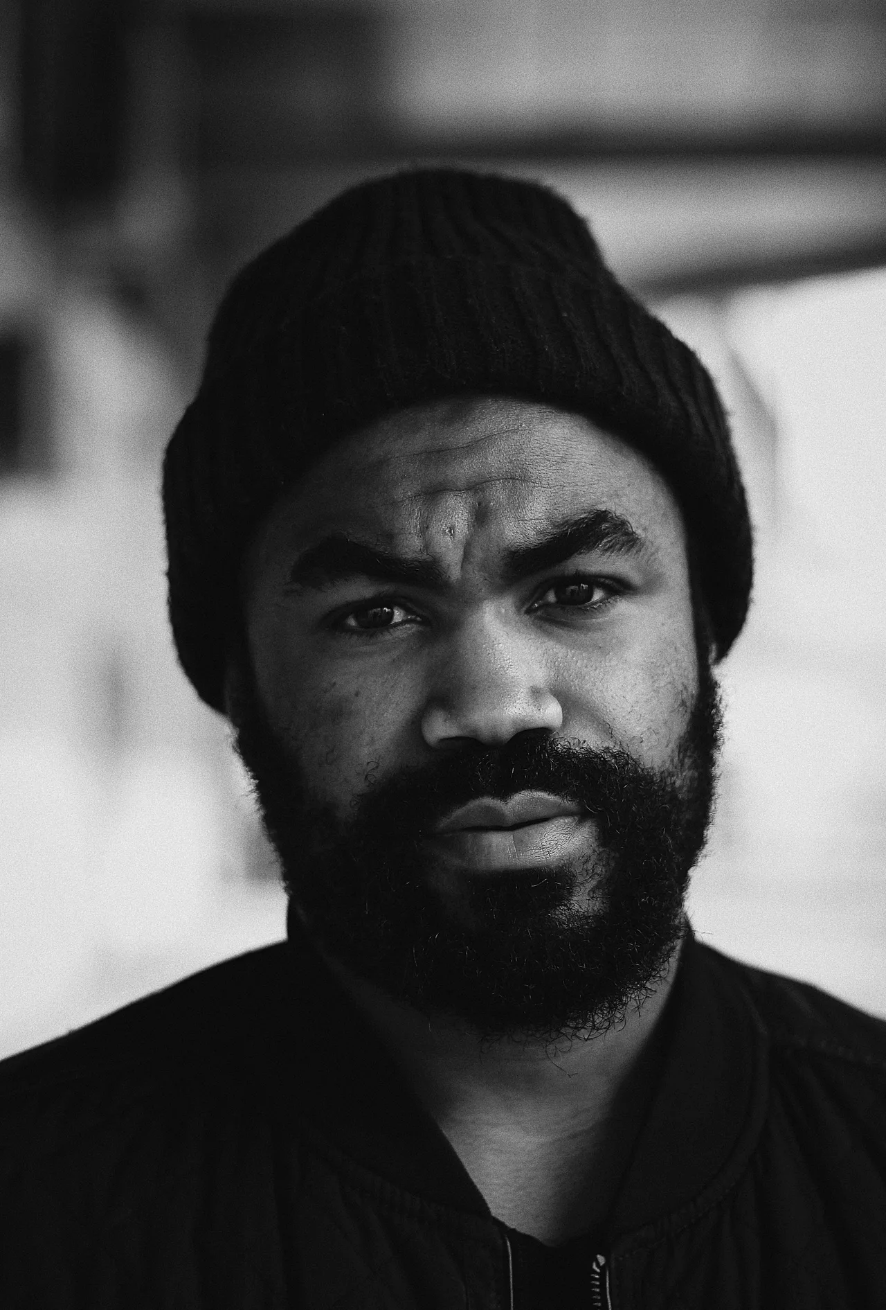 Portrait of Marcus Reed in a black beanie